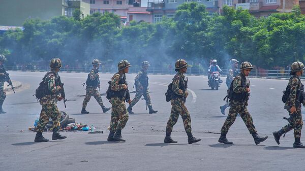 Nepalese army soldiers patrol on a street during protests against social media ban and corruption in Kathmandu, Nepal, Tuesday, Sept. 9, 2025. - Sputnik International