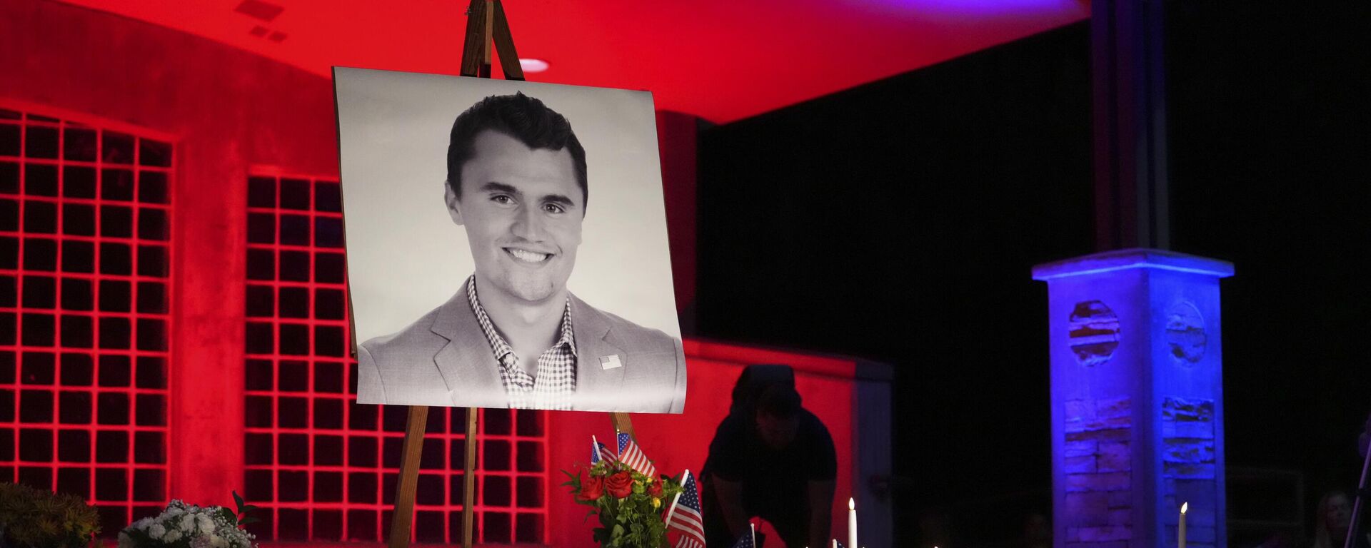 A photo of Charlie Kirk, the CEO and co-founder of Turning Point USA who was shot and killed, stands at his vigil - Sputnik International, 1920, 14.09.2025