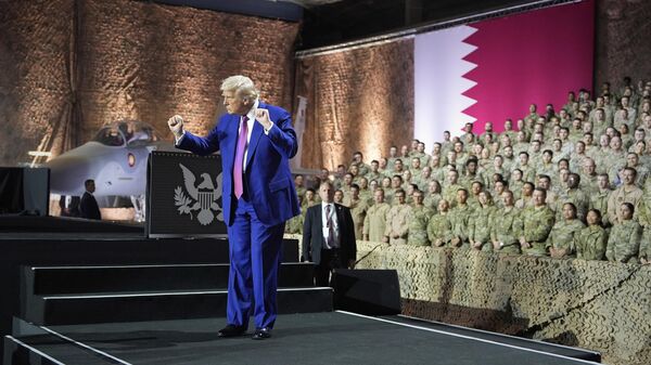President Donald Trump gestures after speaking at the Al Udeid Air Base, Thursday, May 15, 2025, in Doha, Qatar.  - Sputnik International
