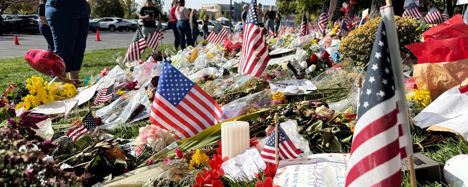 American flags and flowers are displayed at a memorial for Charlie Kirk at Utah Valley University, Monday, Sept. 15, 2025, in Orem, Utah.  - Sputnik International, 1920, 17.09.2025