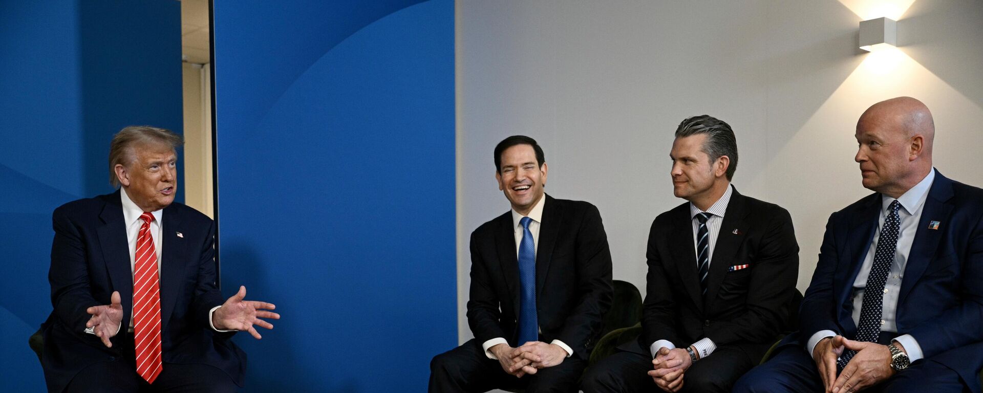 US President Donald Trump, left, speaks next to, from left, US Secretary of State Marco Rubio, US Defence Secretary Pete Hegseth and US' ambassador to NATO Matthew Whitaker, during a meeting with NATO Secretary General Mark Rutte at the NATO summit of heads of state and government in The Hague, Netherlands, Wednesday, June 25, 2025 - Sputnik International, 1920, 18.09.2025