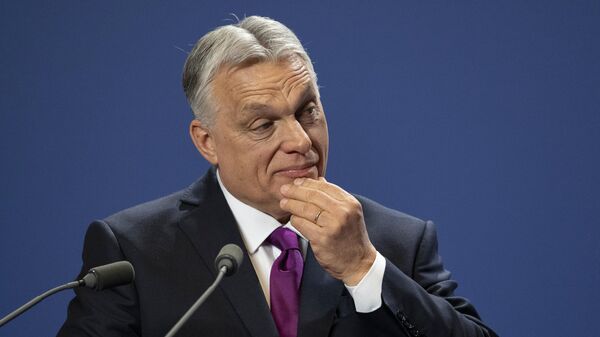 Hungarian Prime Minister Viktor Orban reacts during a press statement at the Carmelite Monastery in the Buda Castle in Budapest, Hungary, Thursday, April 3, 2025.  - Sputnik International