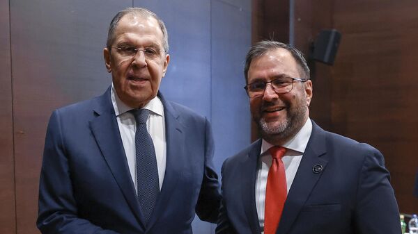Russian Foreign Minister Sergei Lavrov (left) and Venezuelan Foreign Minister Ivan Gil Pinto during a meeting on the sidelines of the Antalya Diplomatic Forum. - Sputnik International