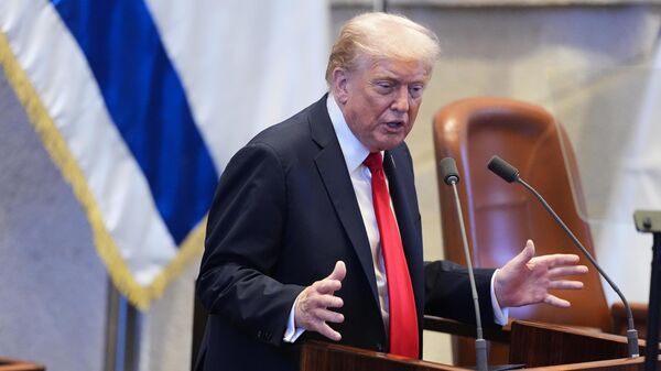 President Donald Trump speaks to the Knesset, Israel's parliament, Monday, Oct. 13, 2025, in Jerusalem. (AP Photo/Evan Vucci, Pool) - Sputnik International