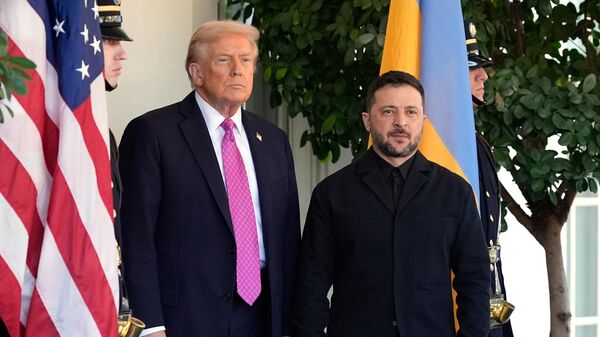 President Donald Trump, left, greets Ukraine's Volodymyr Zelensky at the White House, Friday, Oct. 17, 2025, in Washington.  - Sputnik International