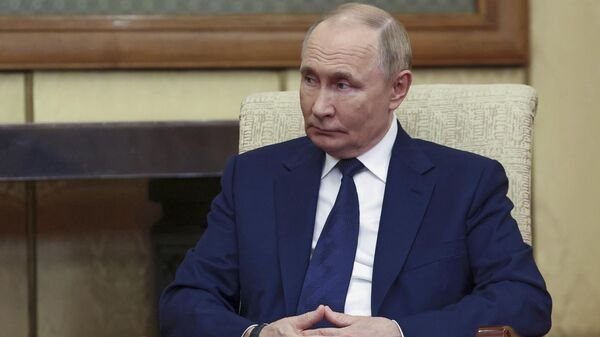 Russian President Vladimir Putin listens to Serbian President Aleksandar Vucic during their meeting at Diaoyutai State Guesthouse in Beijing, China, Tuesday, Sept. 2, 2025 - Sputnik International