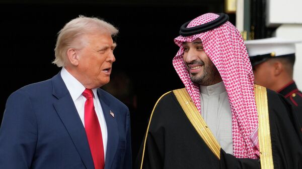 President Donald Trump welcomes Saudi Arabia's Crown Prince Mohammed bin Salman to the White House, Tuesday, Nov. 18, 2025, in Washington - Sputnik International