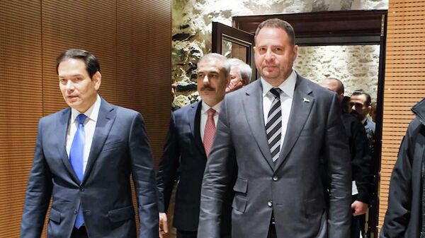 In this handout video grab released by the Turkish Foreign Ministry, US Secretary of State Marco Rubio (L), Turkish Foreign Minister Hakan Fidan and head of the Ukrainian Presidential Office Andriy Yermak (R) - Sputnik International