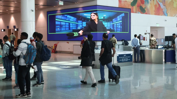 RT India promotional banner at the New Delhi airport. - Sputnik International