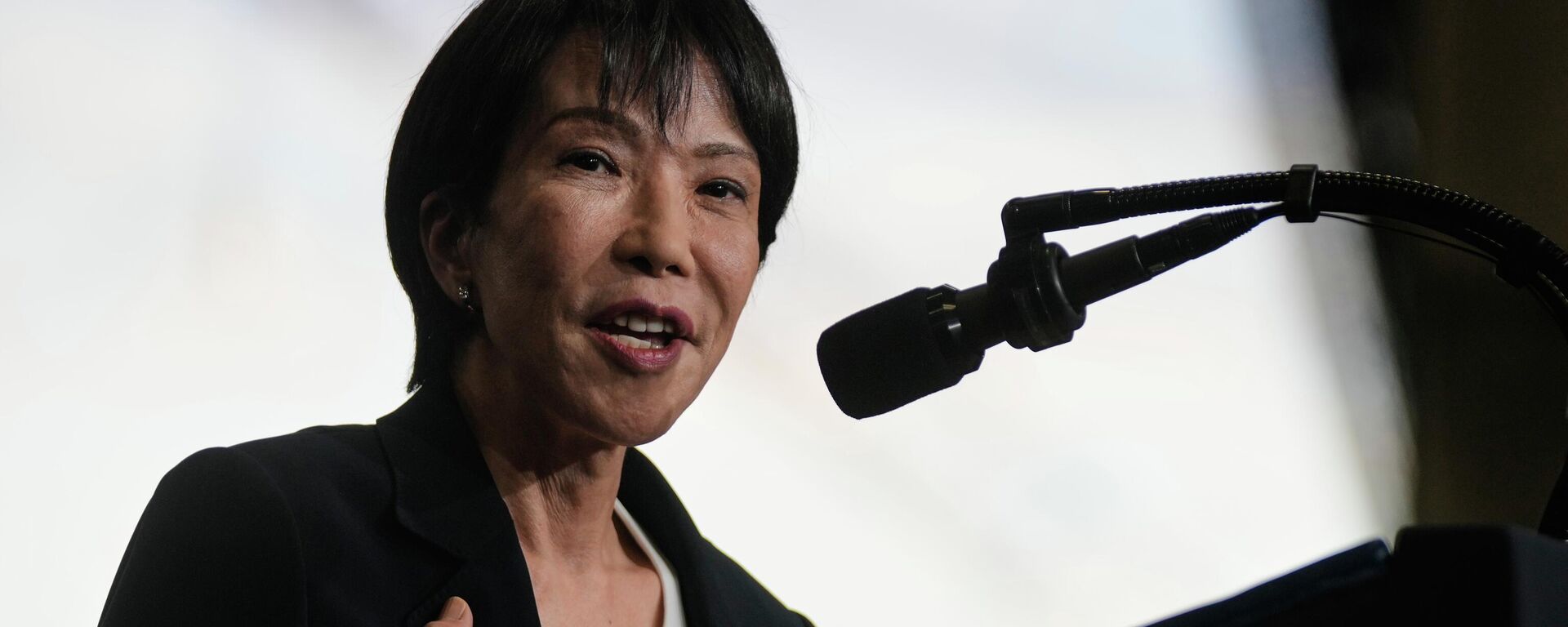 Japanese Prime Minister Sanae Takaichi, with President Donald Trump, speaks to members of the military aboard the USS George Washington, an aircraft carrier docked at a U.S. naval base, in Yokosuka, south of Tokyo, Tuesday, Oct. 28, 2025. (AP Photo/Mark Schiefelbein) - Sputnik International, 1920, 07.12.2025
