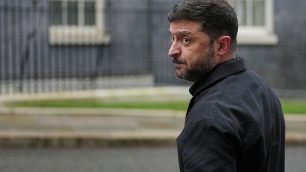 Volodymyr Zelensky at Downing Street, London, Monday, Dec. 8, 2025.  - Sputnik International