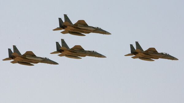 In this photo taken Sunday, Jan. 25, 2009, F-15 warplanes of the Saudi Air Force fly over the Saudi Arabian capital Riyadh during a graduation ceremony at King Faisal Air Force University - Sputnik International