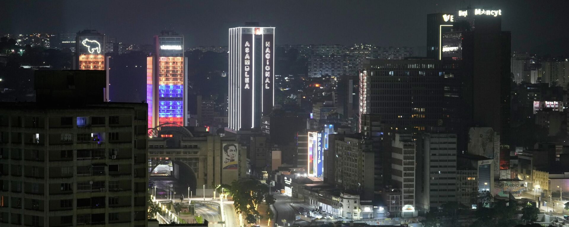 National Assembly building is lightened in downtown Caracas, Venezuela, after explosions and low-flying aircraft were heard, Saturday, Jan. 3, 2026.  - Sputnik International, 1920, 03.01.2026