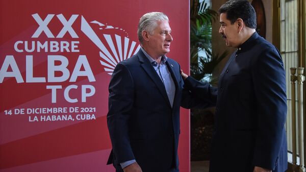 Cuban President Miguel Diaz-Canel, left, greets Venezuelan President Nicolas Maduro during the ALBA Summit at the Palace of the Revolution in Havana, Cuba, Tuesday, Dec. 14, 2021. - Sputnik International