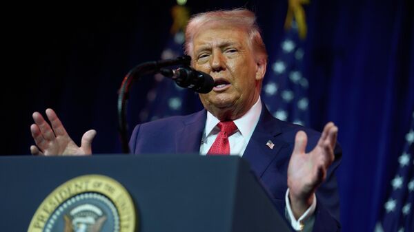 President Donald Trump speaks to House Republican lawmakers during their annual policy retreat, Tuesday, Jan. 6, 2026, in Washington - Sputnik International