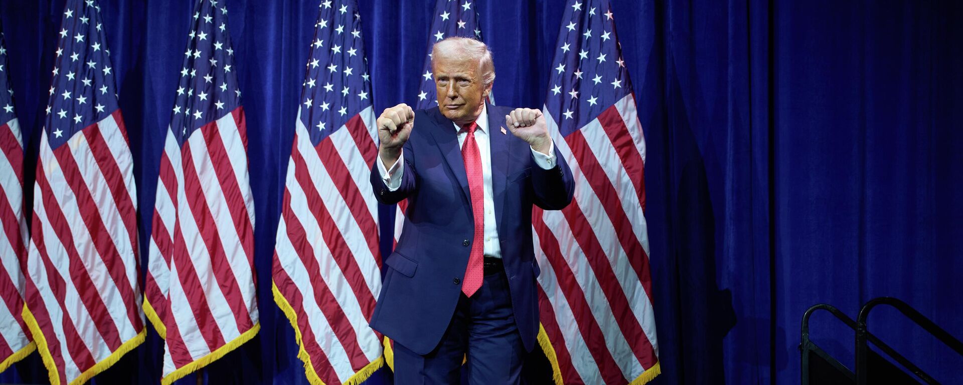 President Donald Trump dances as he walks off stage after speaking to House Republican lawmakers during their annual policy retreat, Tuesday, Jan. 6, 2026, in Washington - Sputnik International, 1920, 08.01.2026