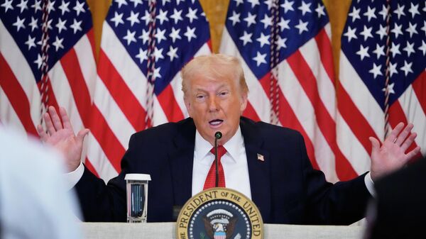 President Donald Trump speaks during an event to promote investment in rural health care in the East Room of the White House, Friday, Jan. 16, 2026, in Washington - Sputnik International