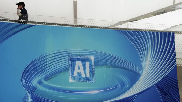 A visitor past by an ad promoting Artificial Intelligence for the upcoming World Artificial Intelligence Conference held in Shanghai, Wednesday, July 5, 2023. (AP Photo/Ng Han Guan) - Sputnik International