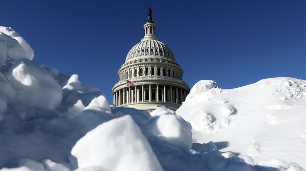 The US Capitol is photographed after a snowstorm, Tuesday, Jan. 27, 2026, in Washington. - Sputnik International