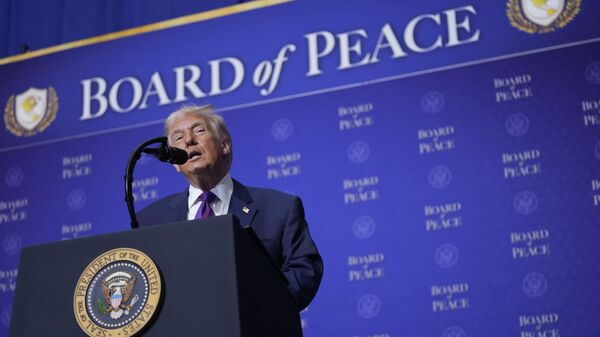 President Donald Trump speaks during a Board of Peace meeting at the U.S. Institute of Peace, Thursday, Feb. 19, 2026, in Washington. (AP Photo/Mark Schiefelbein) - Sputnik International