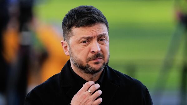 Volodymyr Zelensky arrives at the Bellevue Palace for talks with German President Frank-Walter Steinmeier in Berlin, Germany, Monday, Dec. 15, 2025. - Sputnik International