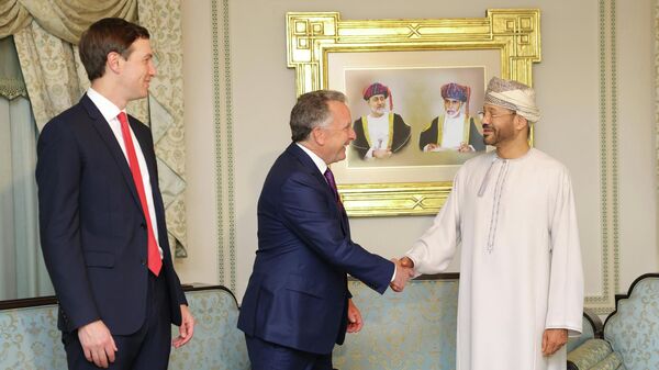 In this photo released by the Oman's Foreign Ministry, Steve Witkoff, White House special envoy, center, shakes hands with Oman's Foreign Minister Sayyid Badr Albusaidi, accompanied by Jared Kushner, left, during a meeting prior to Iran and U.S. negotiations in Muscat, Oman, Friday, Feb. 6, 2026. (Oman Foreign Ministry via AP, File) - Sputnik International