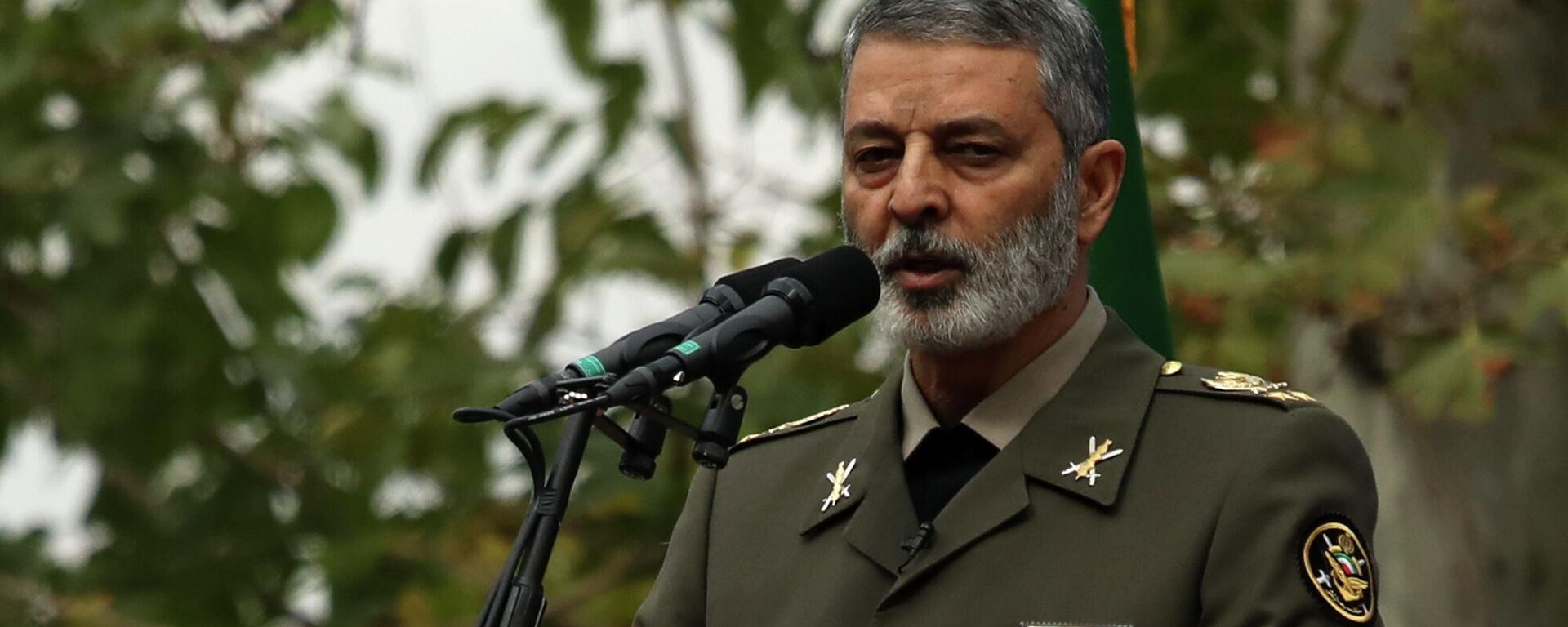 Commander of the Iranian army Gen. Abdolrahim Mousavi speaks during an anti-US annual rally in front of the former U.S. Embassy in Tehran, Iran, - Sputnik International, 1920, 01.03.2026