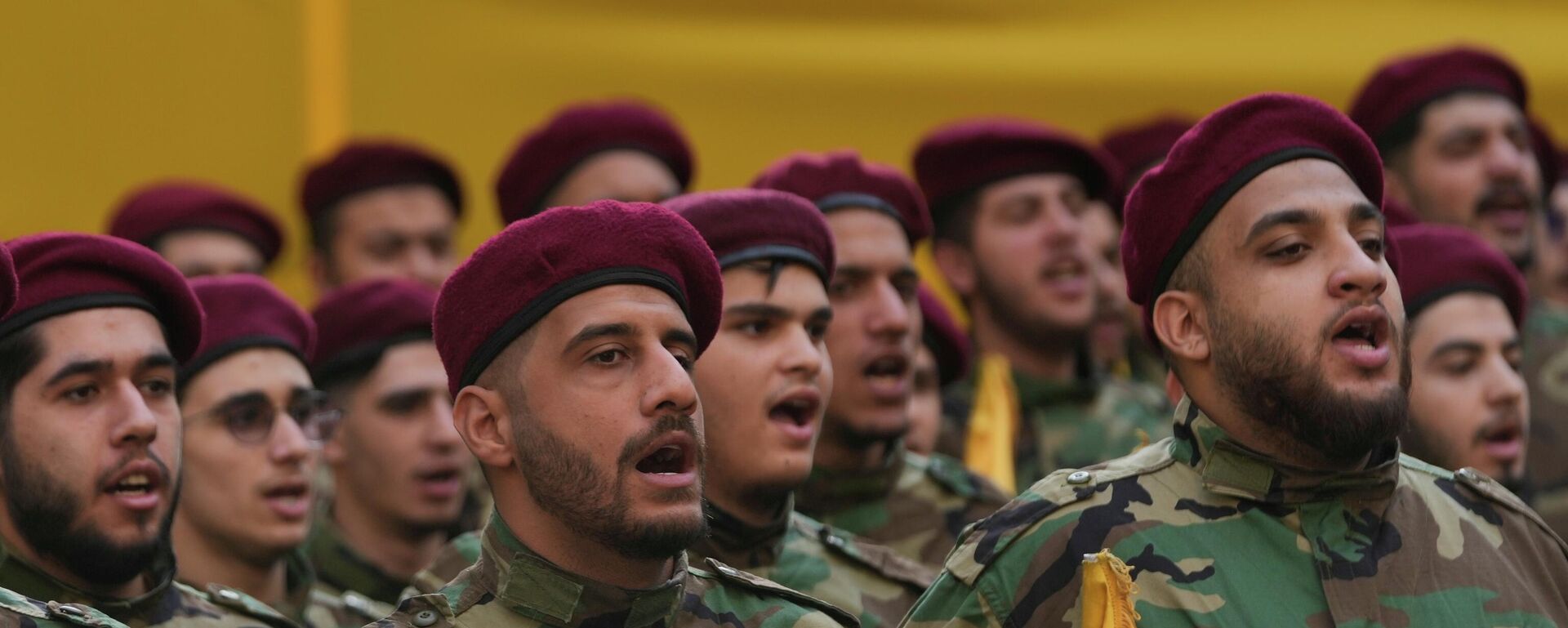 Hezbollah fighters chant during the funeral procession of the group's chief of staff, Haytham Tabtabai, and two other Hezbollah members killed in Sunday's Israeli airstrike, in a southern suburb of Beirut, Lebanon, Monday, Nov. 24, 2025.  - Sputnik International, 1920, 12.03.2026