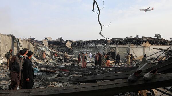 Residents and volunteers inspect the site of a late-Monday airstrike at a drug rehabilitation hospital in Kabul, Afghanistan, Tuesday, March 17, 2026.  - Sputnik International