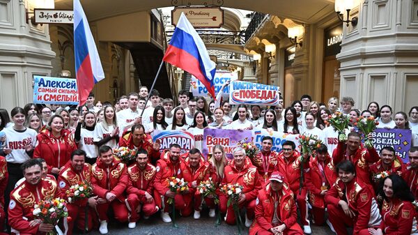 Honoring Russian athletes at GUM. The Russian Paralympic team took third place in the medal standings, with six athletes winning 12 medals: 8 gold, 1 silver, and 3 bronze. - Sputnik International