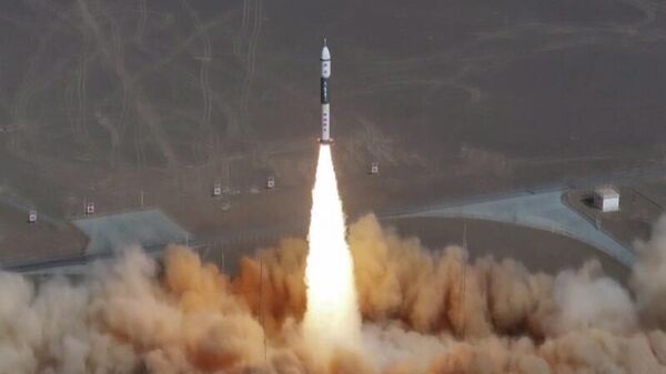 A Kuaizhou-11 Y7 carrier rocket blasts off from the Jiuquan Satellite Launch Center in Northwest China Gansu Province, sending eight satellites into preset orbits, on March 16, 2026. - Sputnik International