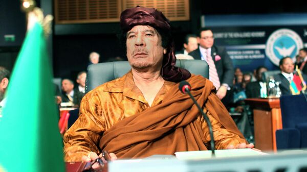 Libyan leader Moammar Gadhafi chairs his delegation during the opening session of the 15th Non-Aligned Movement summit in the Egyptian Red Sea resort of Sharm el-Sheik, Egypt, Wednesday, July 15, 2009 - Sputnik International