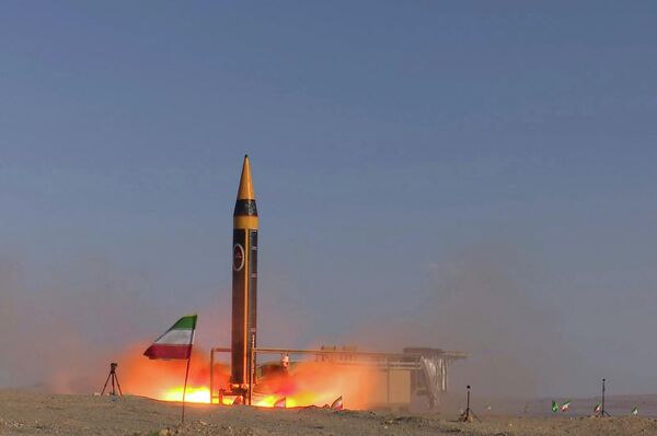 In this photo released by the Iranian Defense Ministry on May 25, 2023, Khorramshahr-4 missile is launched at an undisclosed location, Iran (Iranian Defense Ministry via AP) - Sputnik International