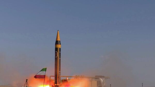 In this photo released by the Iranian Defense Ministry on May 25, 2023, Khorramshahr-4 missile is launched at an undisclosed location, Iran (Iranian Defense Ministry via AP) - Sputnik International