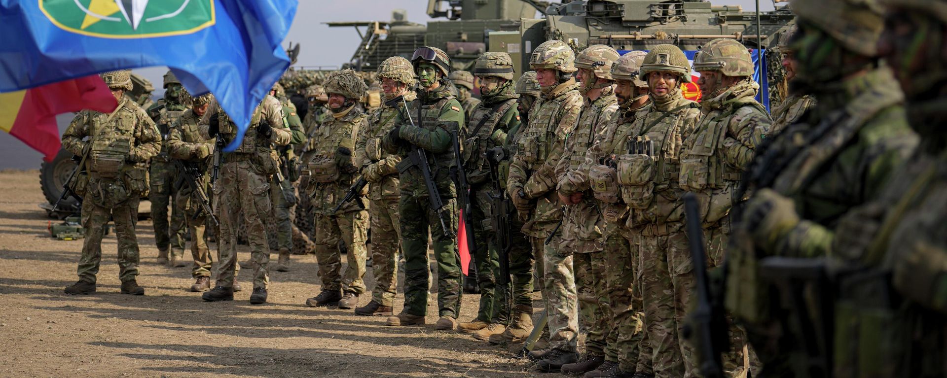 Servicemen stand at the end of the Steadfast Dart 2025 NATO exercise. File photo - Sputnik International, 1920, 30.06.2026