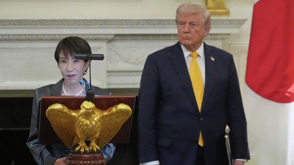 Japan's Prime Minister Sanae Takaichi speaks during a dinner with President Donald Trump in the State Dining Room of the White House, Thursday, March 19, 2026. - Sputnik International