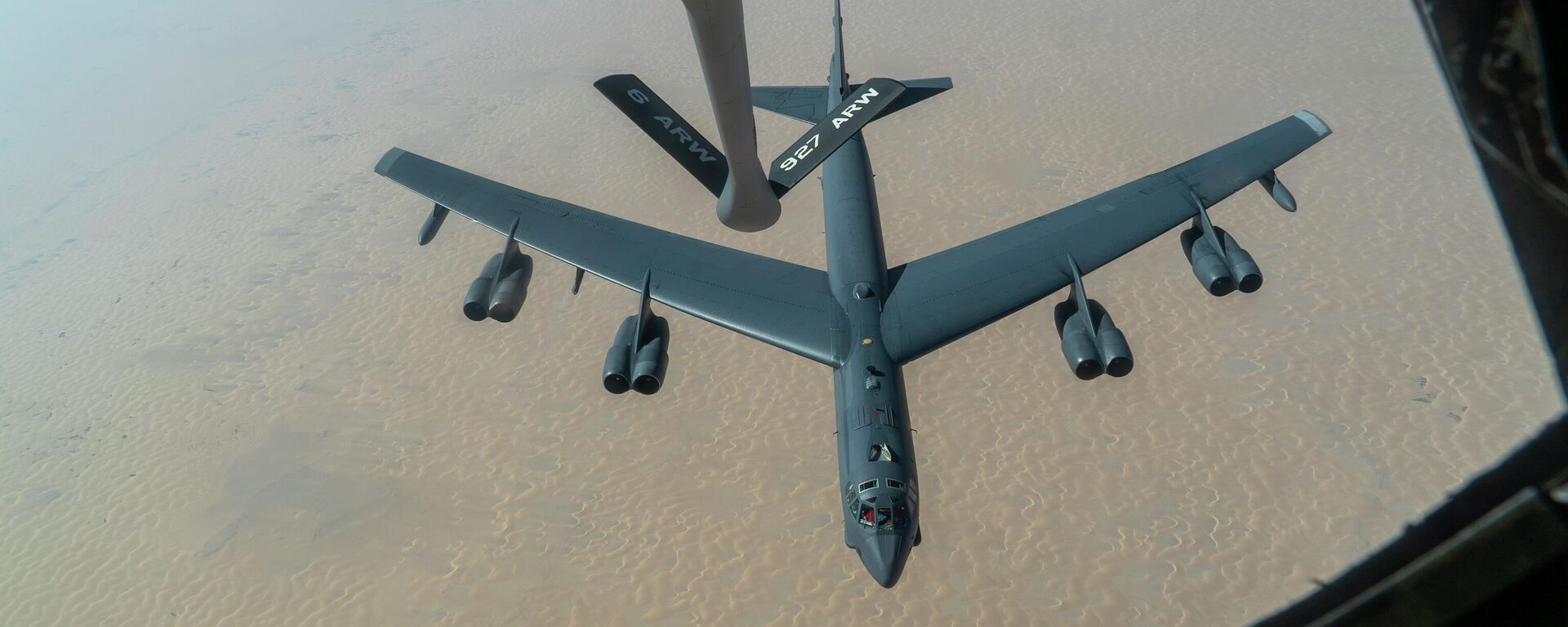 A US Air Force B-52H Stratofortress from Minot Air Force Base, N.D., is refueled by a KC-135 Stratotanker in the US Central Command area of responsibility Wednesday, Dec. 30, 2020 - Sputnik International, 1920, 28.03.2026