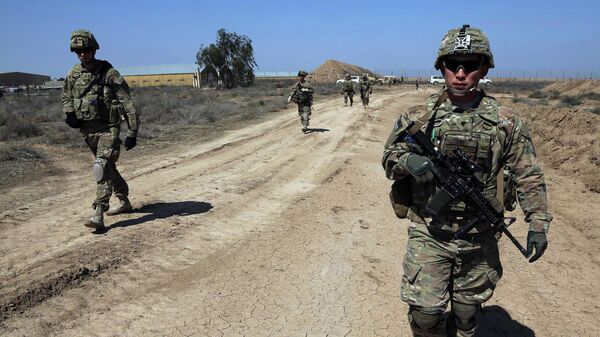 US soldiers participate in a military exercise to help train Iraqi security forces in Taji, north of Baghdad, Iraq, Saturday, March 21, 2015 - Sputnik International