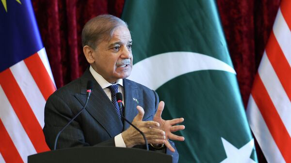 Pakistan's Prime Minister Shehbaz Sharif speaks during a news conference with Malaysia's Prime Minister Anwar Ibrahim during Sharif's visit in Putrajaya, Malaysia, Monday, Oct. 6, 2025 - Sputnik International