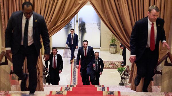 U.S. Vice President JD Vance, center, walks up a flight of stairs to meet with Pakistan's Prime Minister Shehbaz Sharif, Saturday, April 11, 2026, in Islamabad, for talks about Iran. - Sputnik International