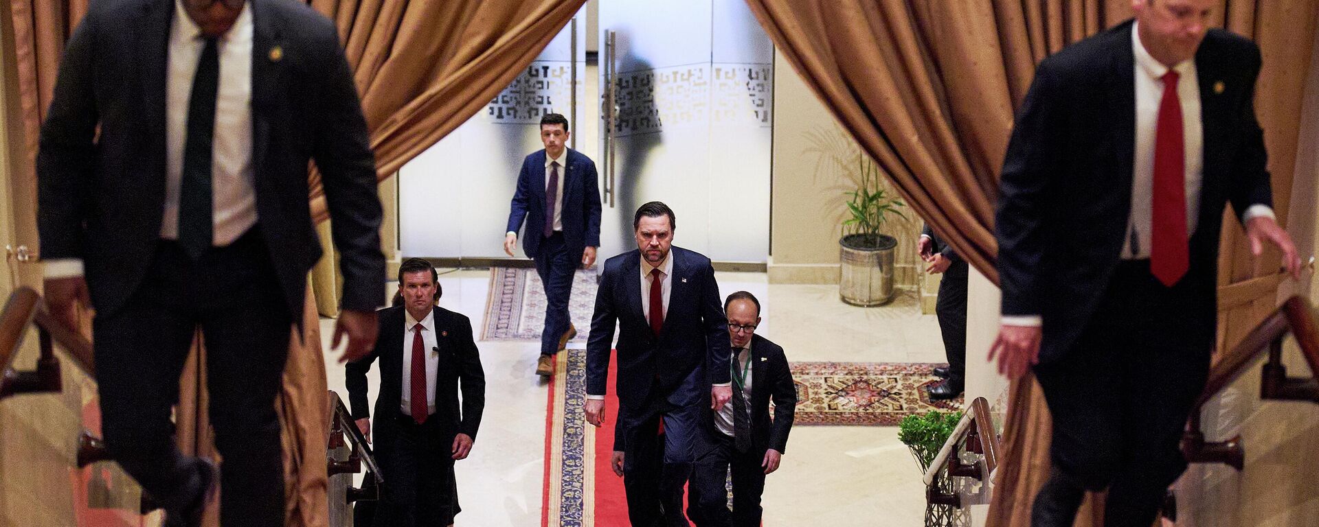 U.S. Vice President JD Vance, center, walks up a flight of stairs to meet with Pakistan's Prime Minister Shehbaz Sharif, Saturday, April 11, 2026, in Islamabad, for talks about Iran. - Sputnik International, 1920, 12.04.2026