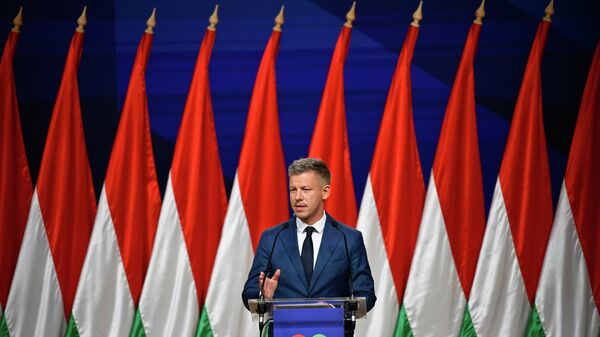 Peter Magyar gestures as he speaks to the media in Budapest, Hungary, Monday, April 13, 2026, after defeating Prime Minister Viktor Orban's party in the country's parliamentary elections. - Sputnik International