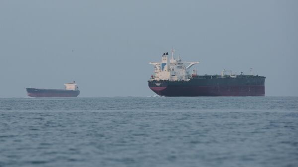 Tankers anchored in the Strait of Hormuz off the coast of Qeshm Island, Iran, April 18, 2026.  - Sputnik International