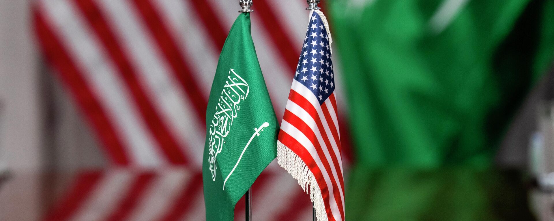 American and Saudi Arabia flags are seen during a meeting of Secretary of Defense Pete Hegseth and Saudi Defense Minister Prince Khalid bin Salman, Monday, Feb. 24, 2025, at the Pentagon in Washington. (AP Photo/Jacquelyn Martin) - Sputnik International, 1920, 22.04.2026