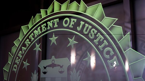 The words Department of Justice are displayed at the FBI field office in Portland, Ore., Thursday, Jan. 16, 2025. (AP Photo/Jenny Kane) - Sputnik International
