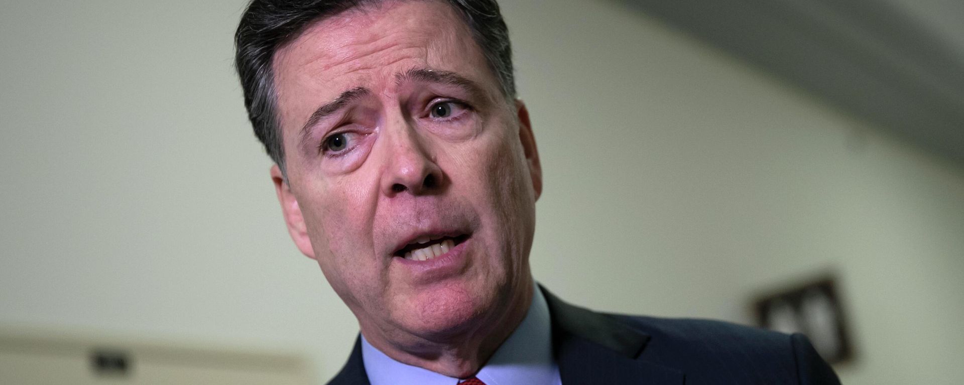 Former FBI Director James Comey speaks to reporters on Capitol Hill Washington, Monday, Dec. 17, 2018, after a second closed-door interview with two Republican-led committees investigating what they say was bias at the Justice Department before the 2016 presidential election - Sputnik International, 1920, 29.04.2026