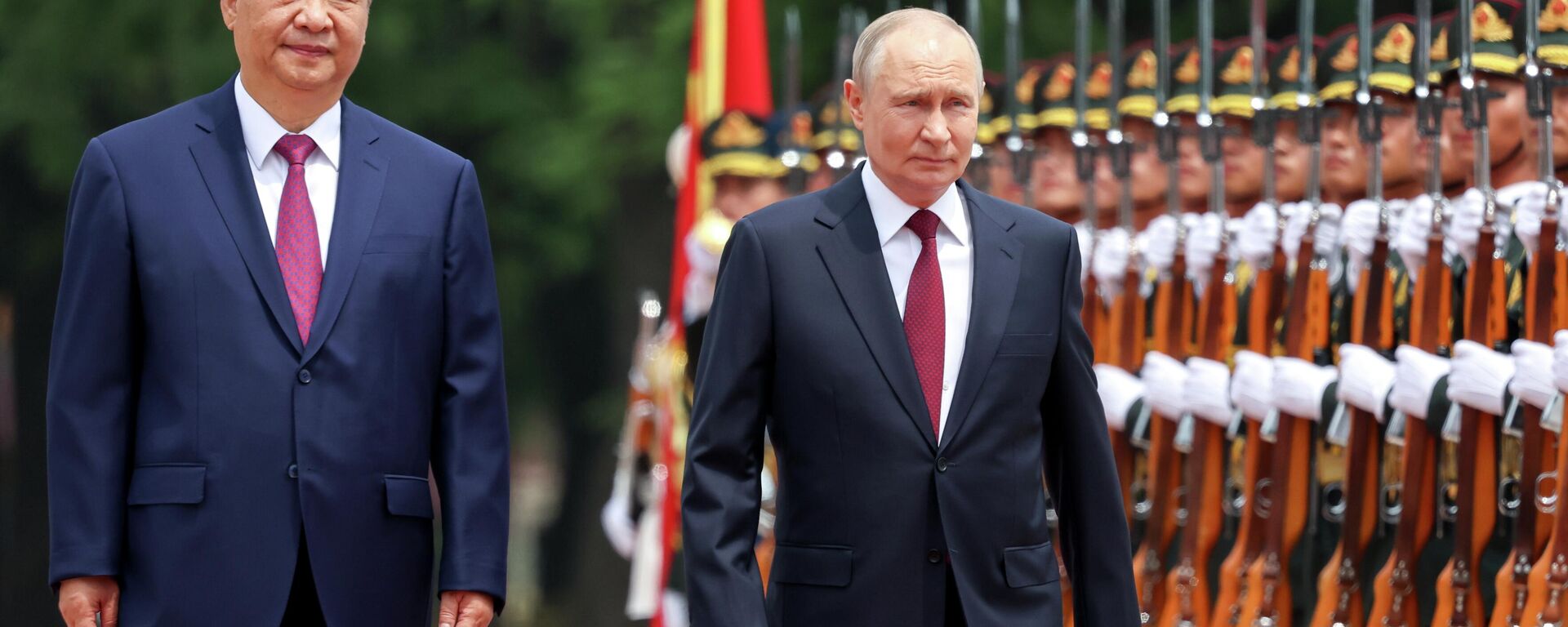 Russian President Vladimir Putin and  Chinese President Xi Jinping - Sputnik International, 1920, 19.05.2026