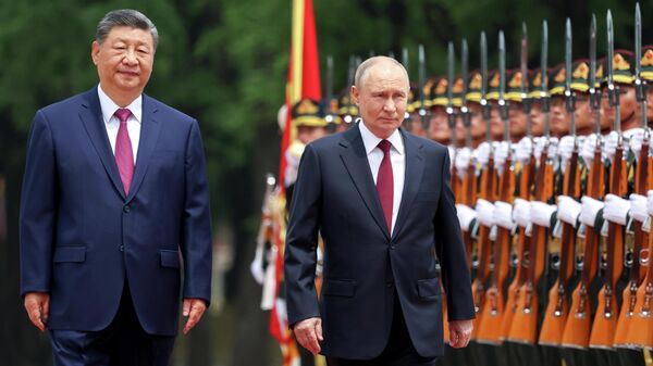 Russian President Vladimir Putin and  Chinese President Xi Jinping - Sputnik International