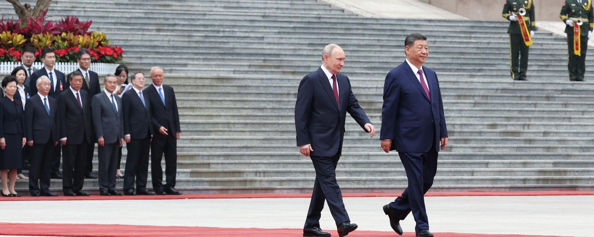 Russian President Vladimir Putin and Chinese President Xi Jinping - Sputnik International, 1920, 20.05.2026
