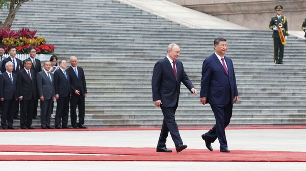 Russian President Vladimir Putin and Chinese President Xi Jinping - Sputnik International